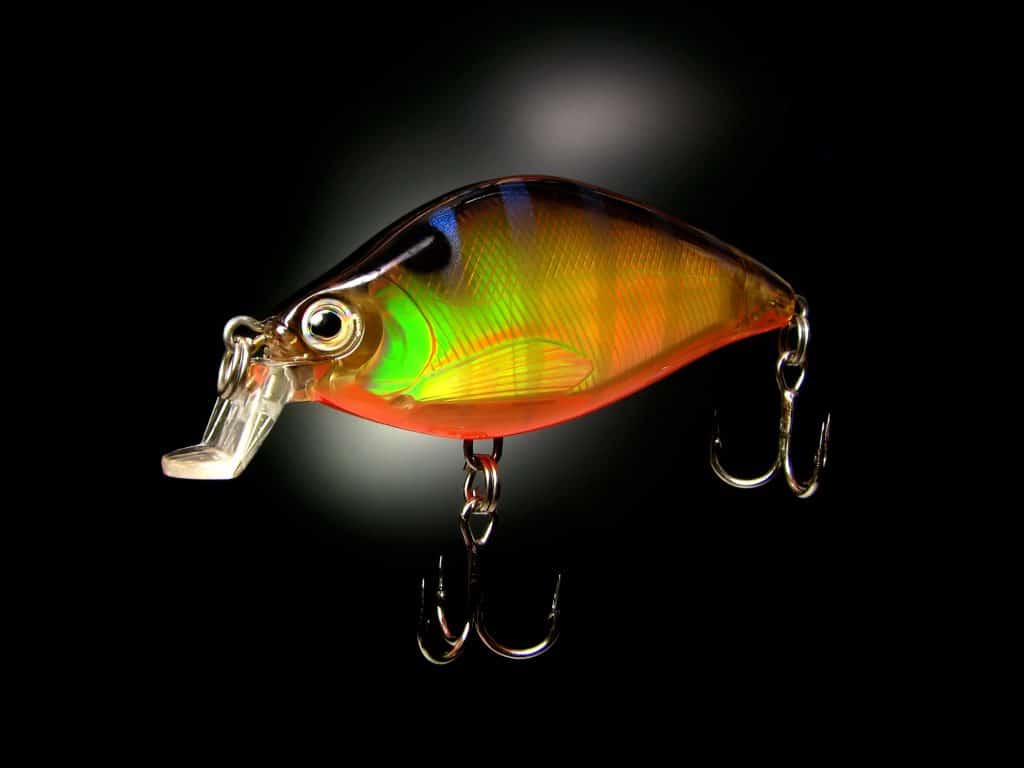 Fishing bait - wobbler on a black background