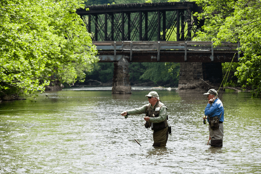 Two old man fishing in the river