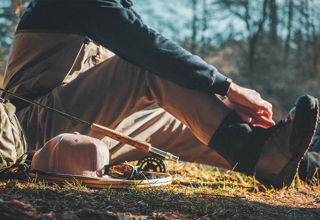 man wearing fishing waders