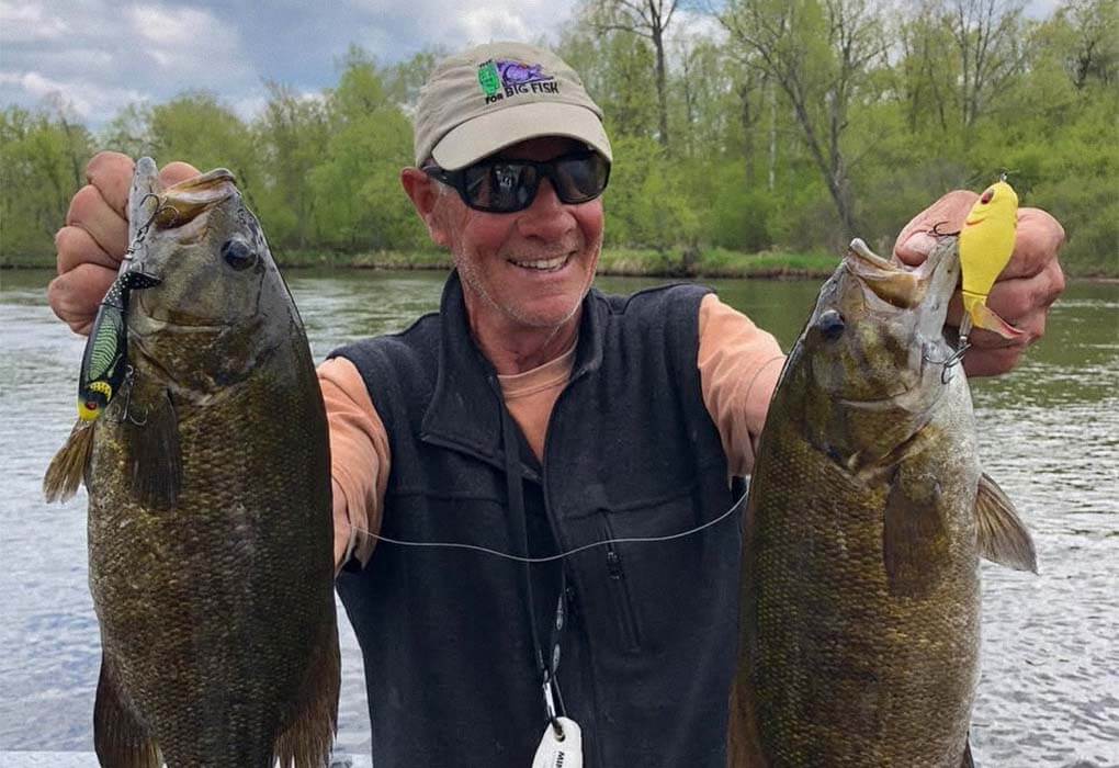 Larry Dahlberg displays the size of smallmouth bass that he fools with the lure he invented, the Whopper Plopper (photo courtesy of Larry Dahlberg)