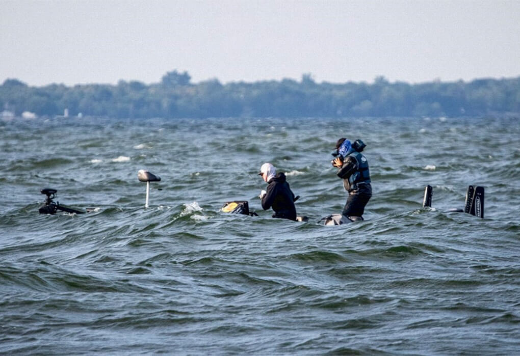 No, Josh Bertrand’s boat isn’t sinking. He is fishing in the swells on a windy day in a Bass Pro Tour tournament (photo by Kyle Wood/Major League Fishing)