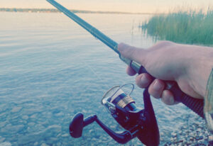 testing fishing rod on a lake