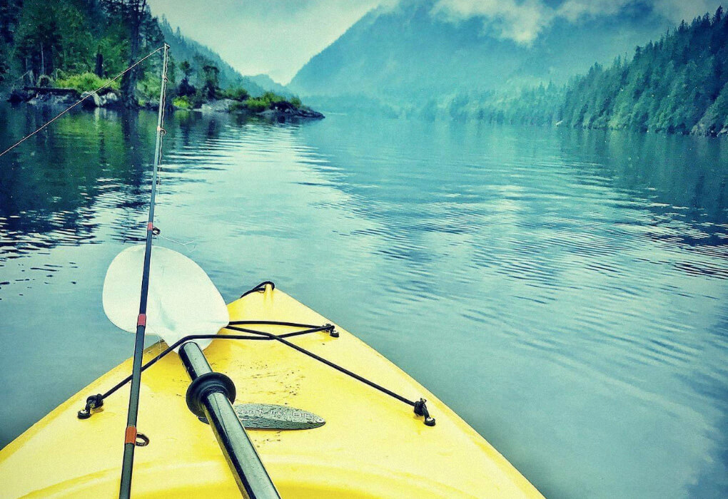 kayak fishing paddle out on water