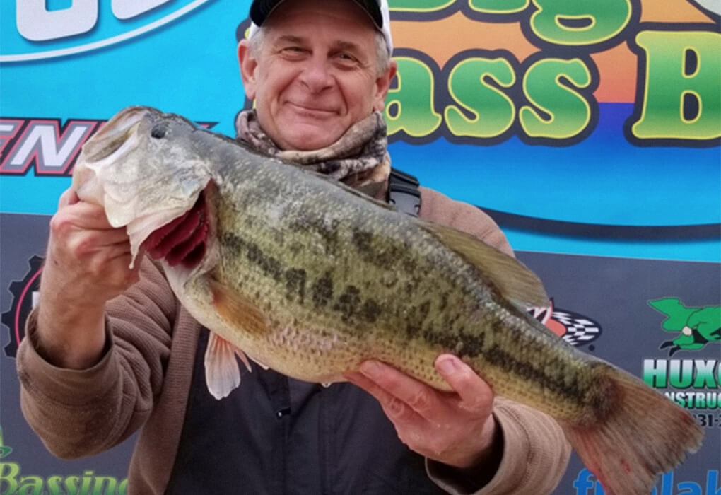 Rick Voss posed with the $100,000 bass he caught during the Big Bass Bash at Lake of the Ozarks