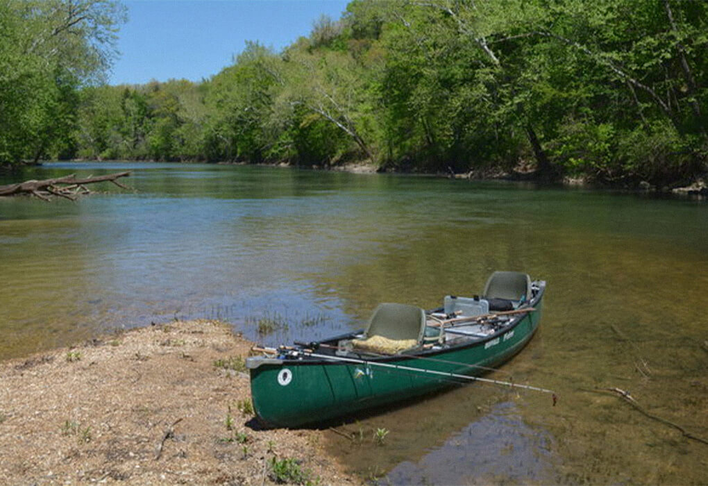 A summer day, a cool stream and a canoe. It's time to go fishing. (Photo by Brent Frazee) 