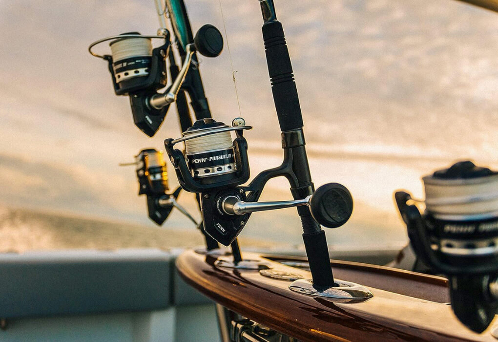Penn Pursuit ssaltwater fishing reel mounted on a rod holder
