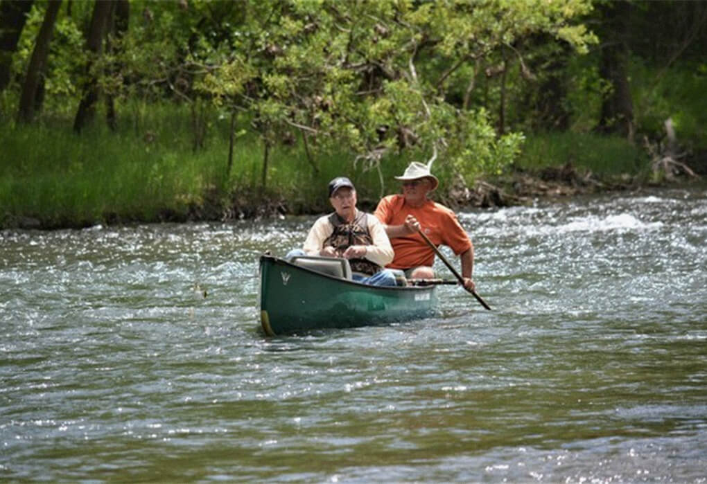 Thayne Smith (left) and guide Dennis Whiteside enjoyed a perfect spring day on an Ozarks float stream. (Photo by Brent Frazee)