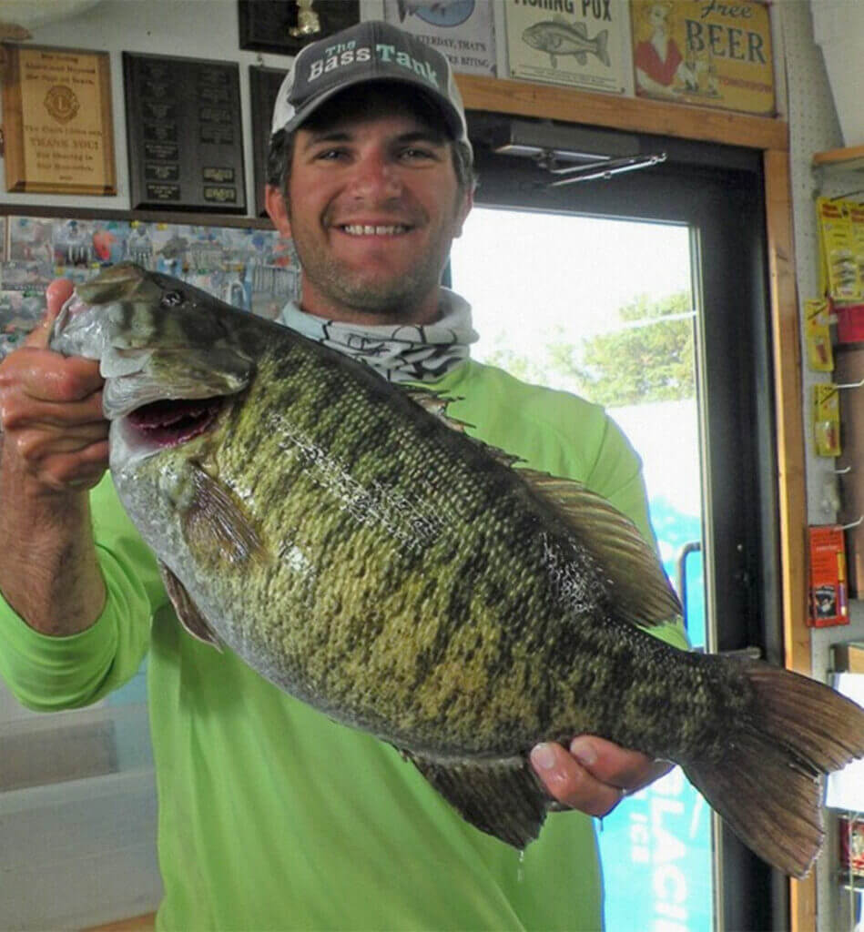 Troy Diede displayed his South Dakota state-record smallmouth bass. (Photo courtesy of South Whitlock Resort)