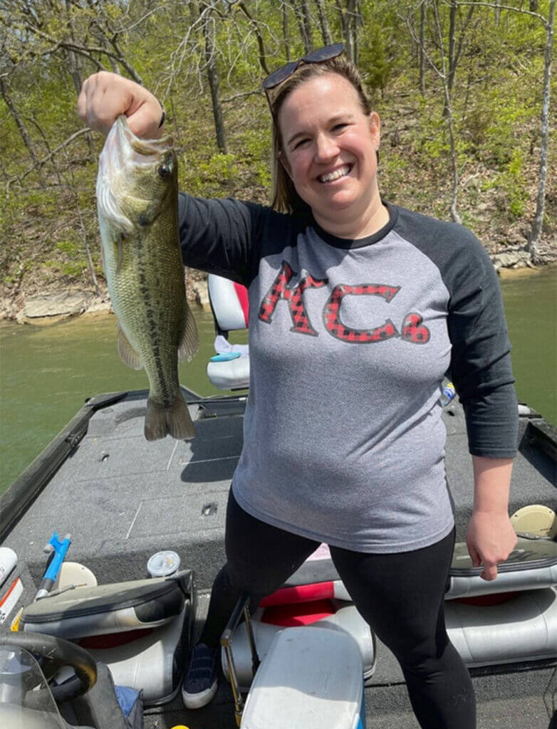 woman caught bass fish