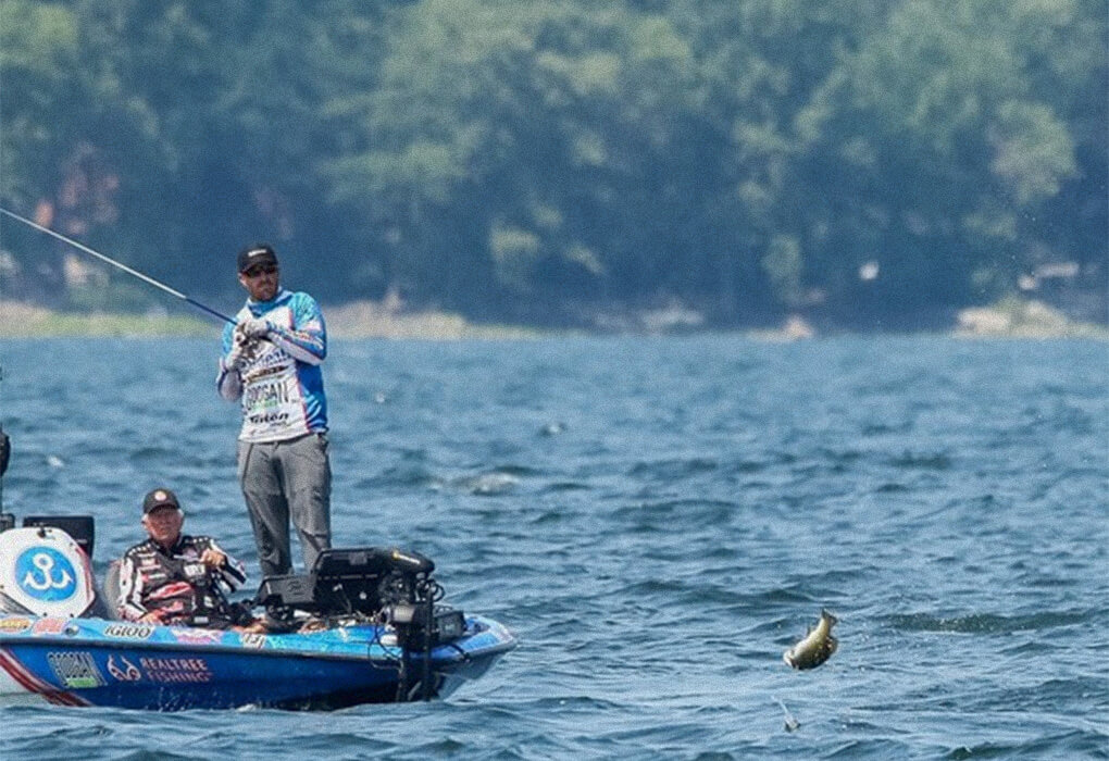 Jacob Wheeler fought a high-flying smallmouth bass during a Bass Pro Tour tournament he won on Lake Champlain. (photo by Josh Gassmann/Major League Fishing)