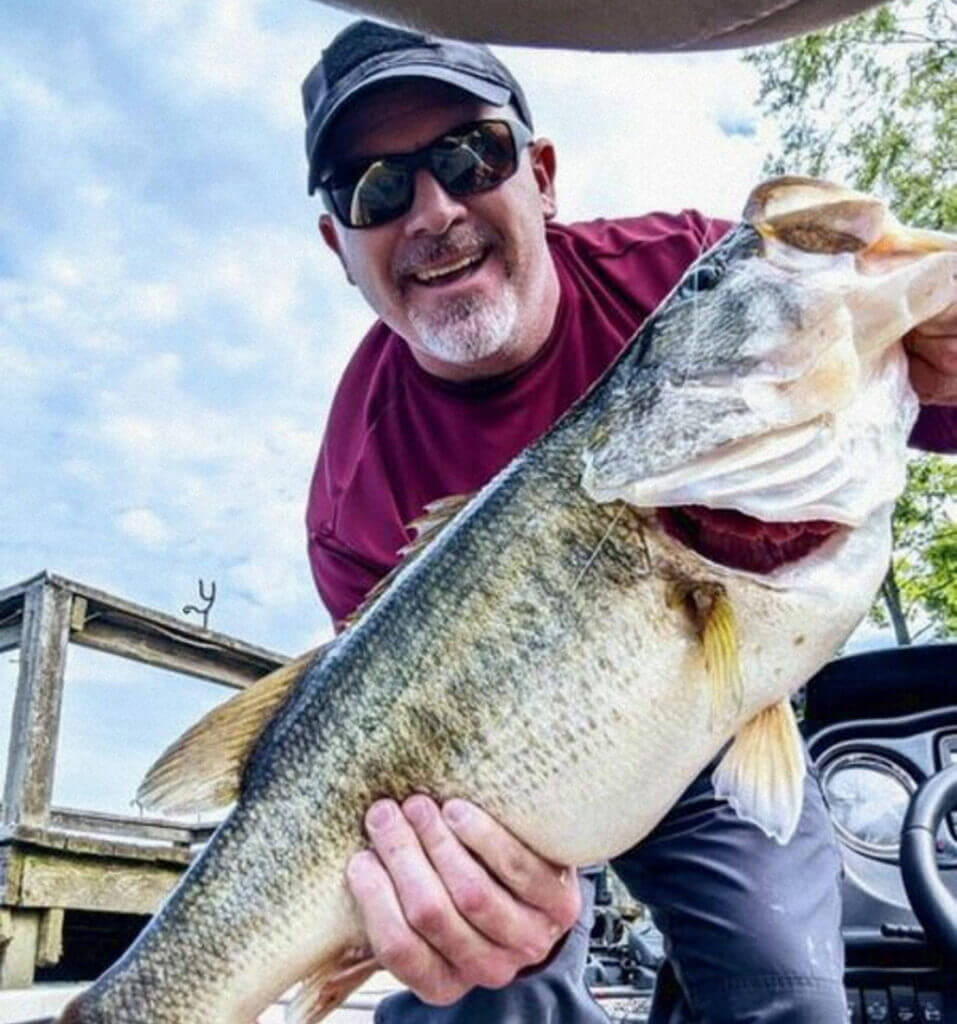 Clint Walton, a nurse from Bossier City, La., displayed the 9-pound, 13-ounce bass he caught this spring. (photo courtesy of Clint Walton)