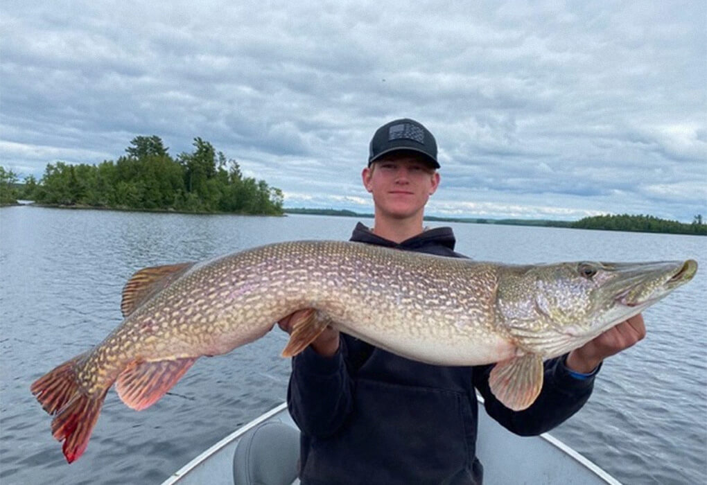 Brecken Kobylecky displayed the giant northern pike that gave him the catch-and-release state record in Minnesota. (Photo courtesy of the Minnesota Department of Natural Resources)
