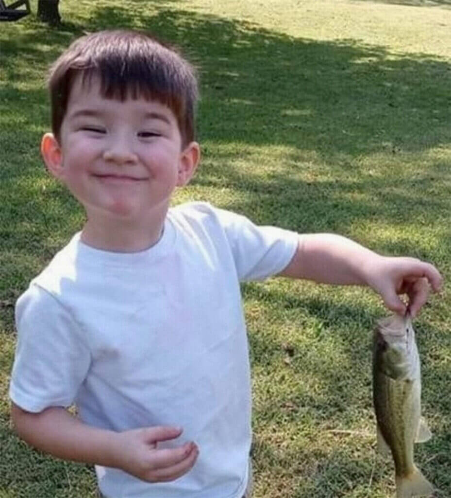 Killian McGaha, 3, proudly showed off the first fish he ever caught