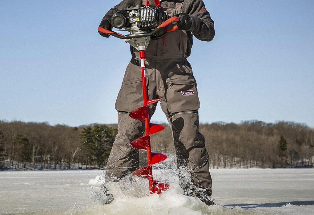 ma drilling in ice with an ice auger