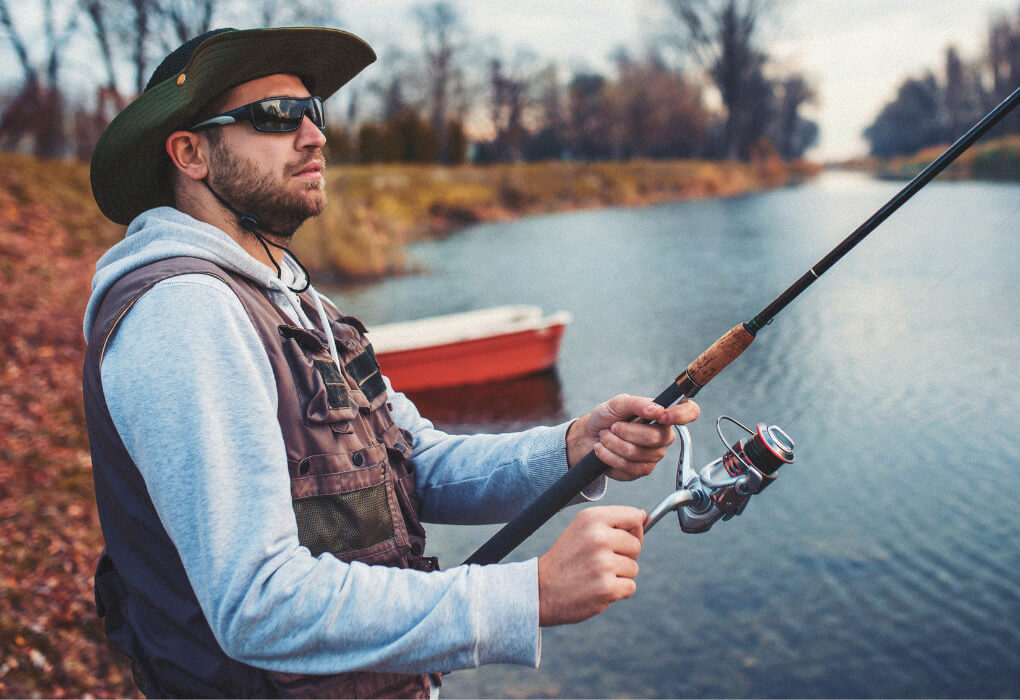 fisherman wearing fishing sunglasses