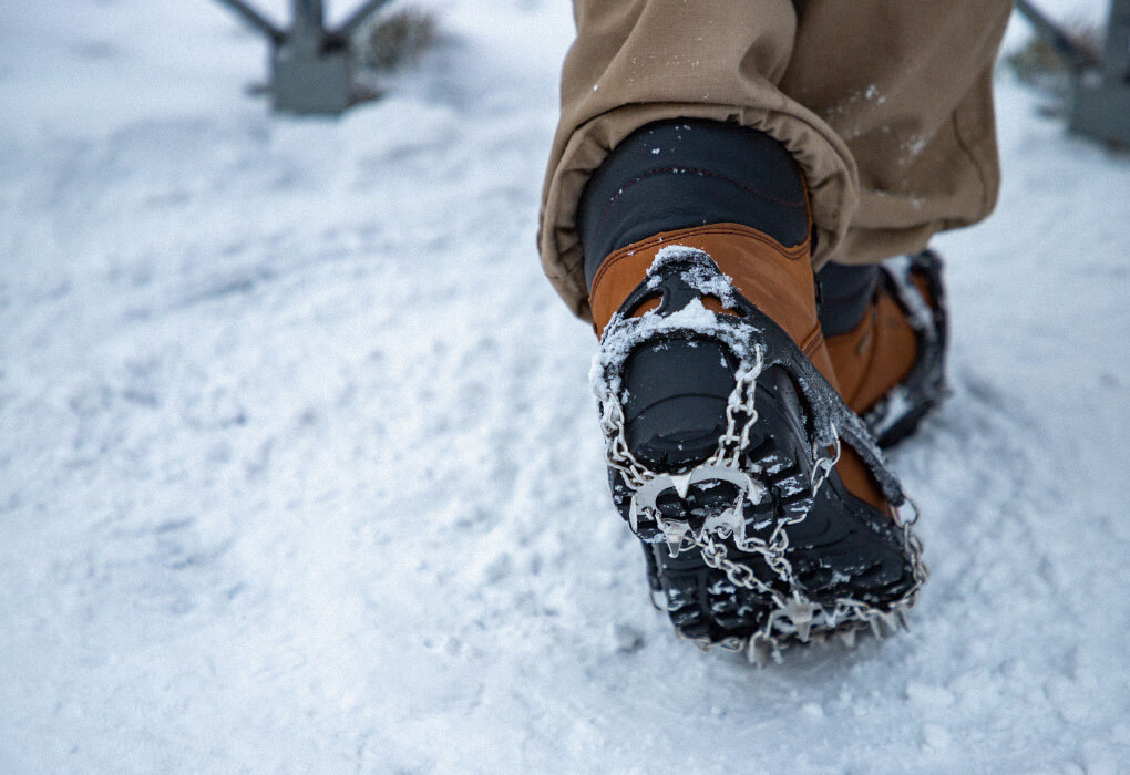 ice fishing cleats mounted on boots